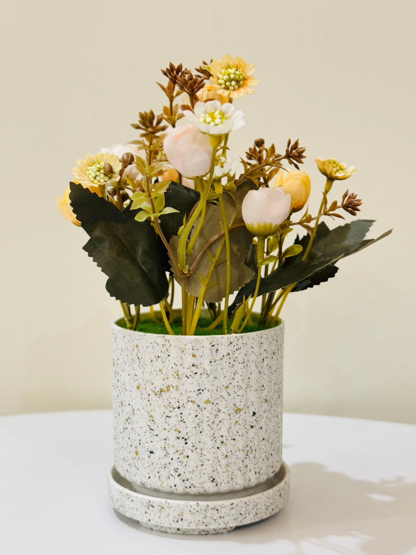 Textured pot with flowers